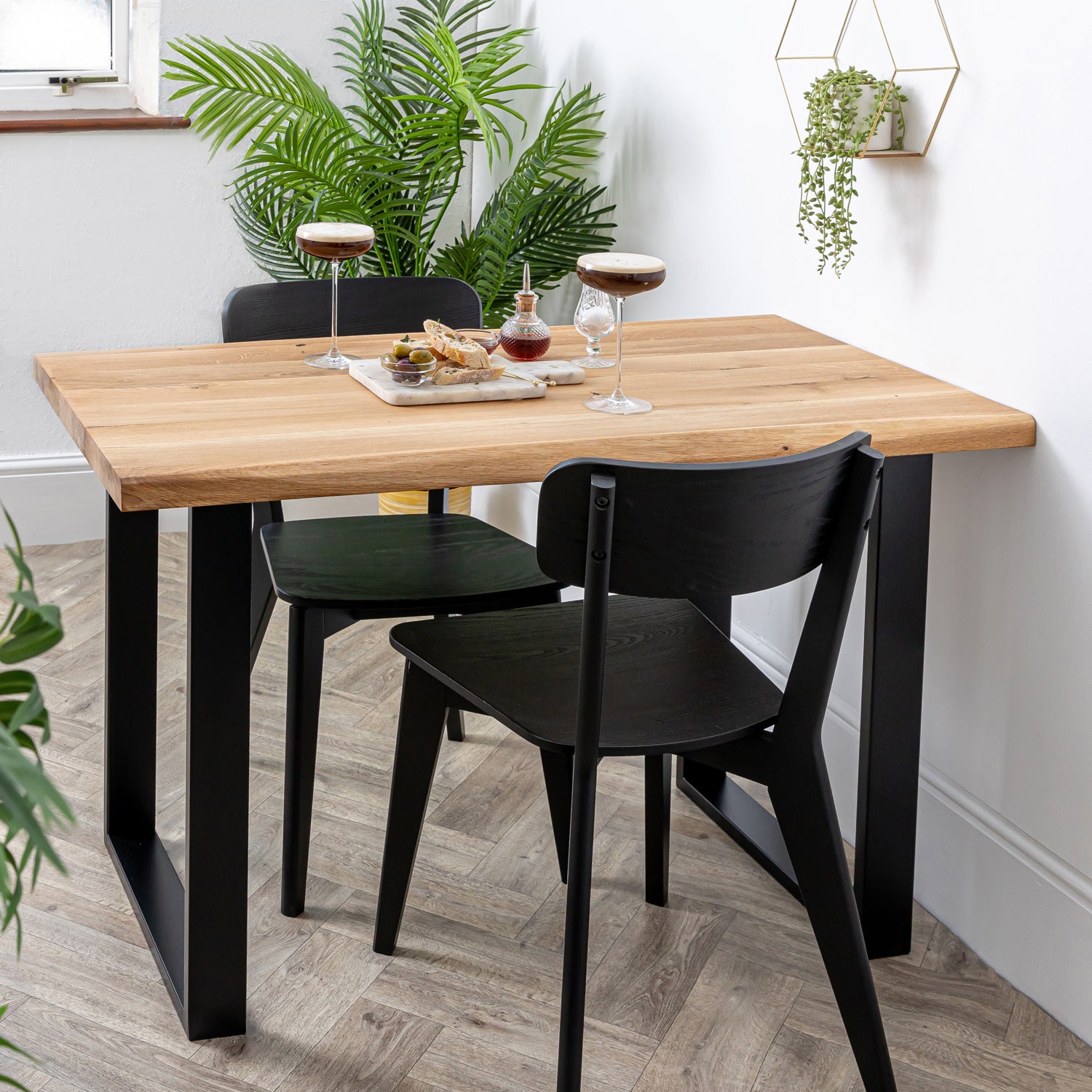 Solid wood top dining deals table with metal legs