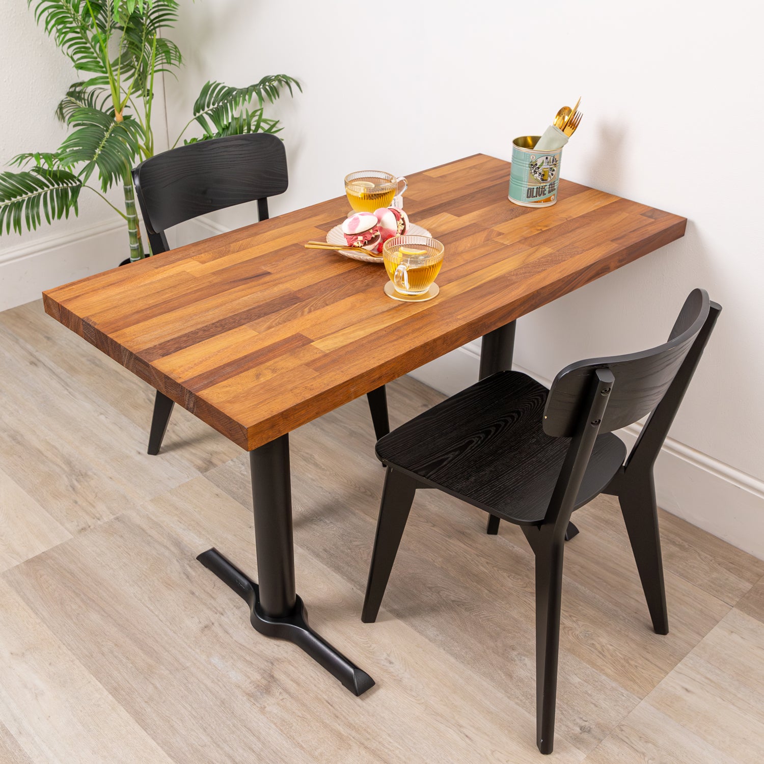 Iroko Solid Wood Table with Black Twin Pedestal Cast Iron Table Base